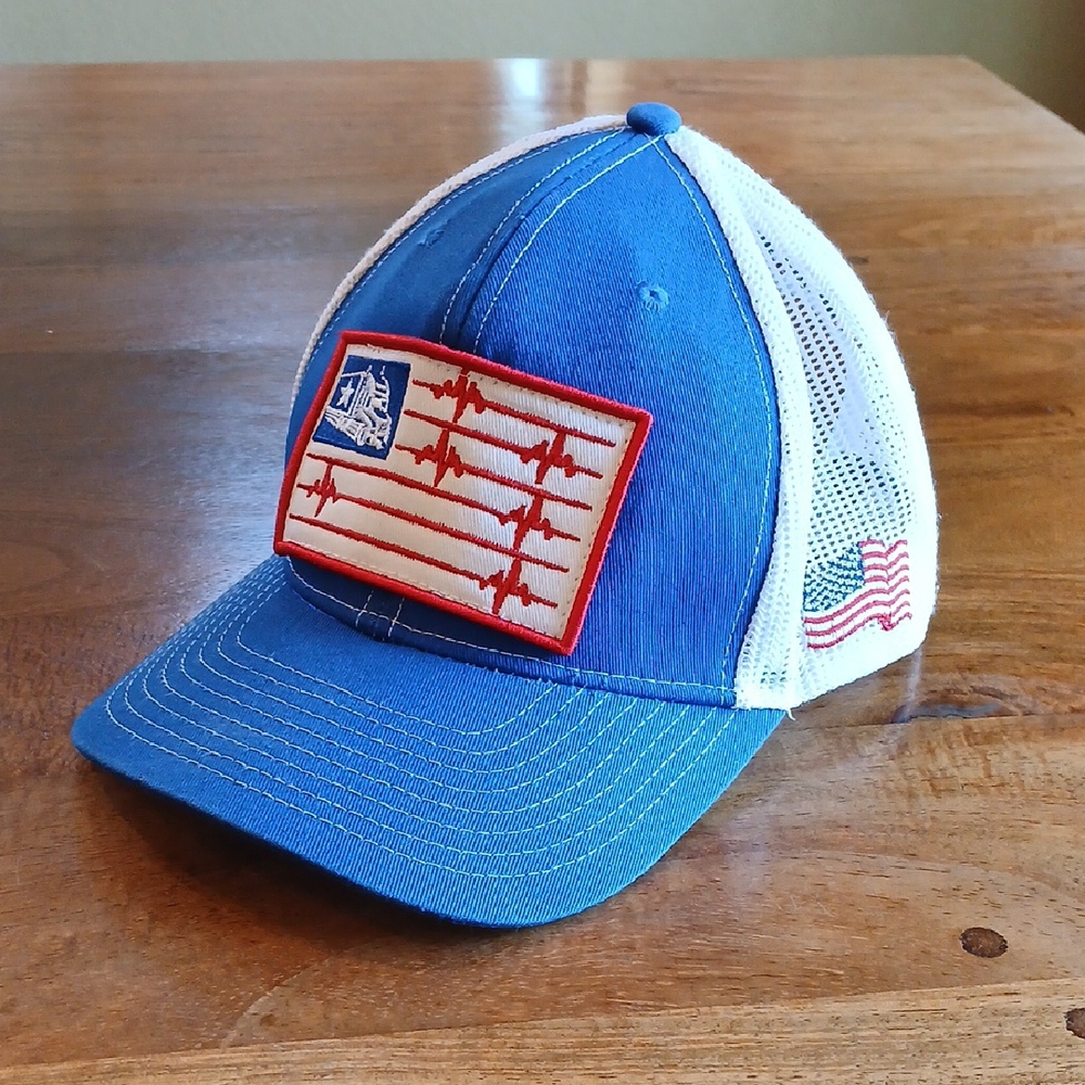 Wild Wear Trucker Hat with Flag Patch. (Makeup Staining on Forehead Ring)